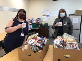 Staff with food boxes