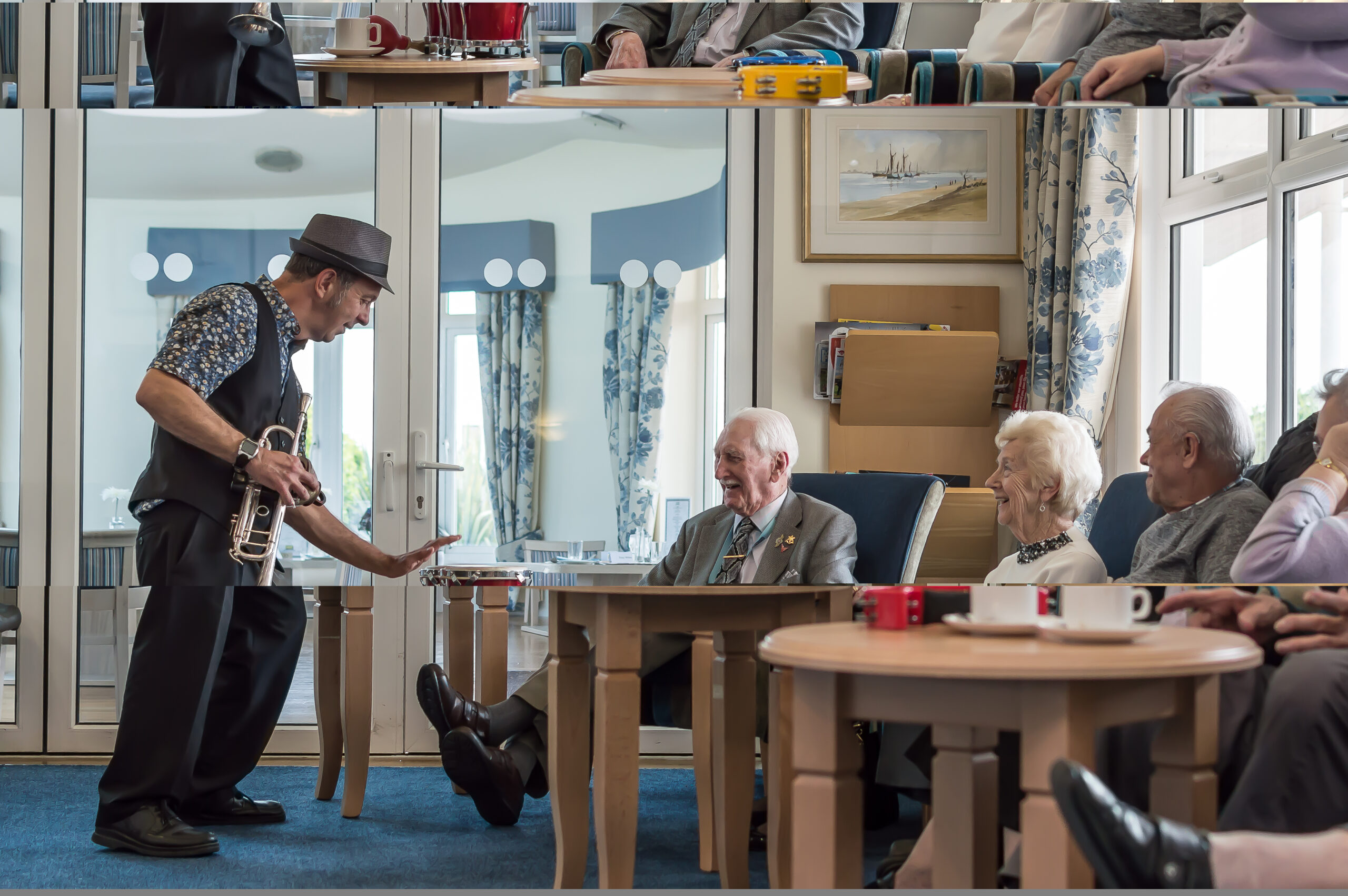 Man playing guitar in care home